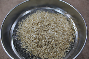 Milled grain on a test sieve